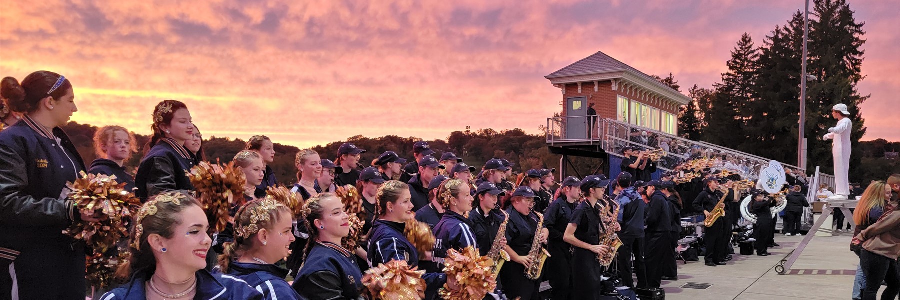 Band with pink sun set